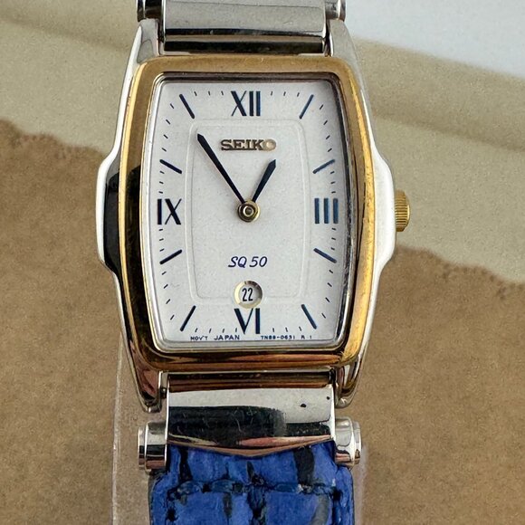 Vintage Seiko SQ 50 Tourneau watch for women features a two-tone Case Blue Strap main image 7